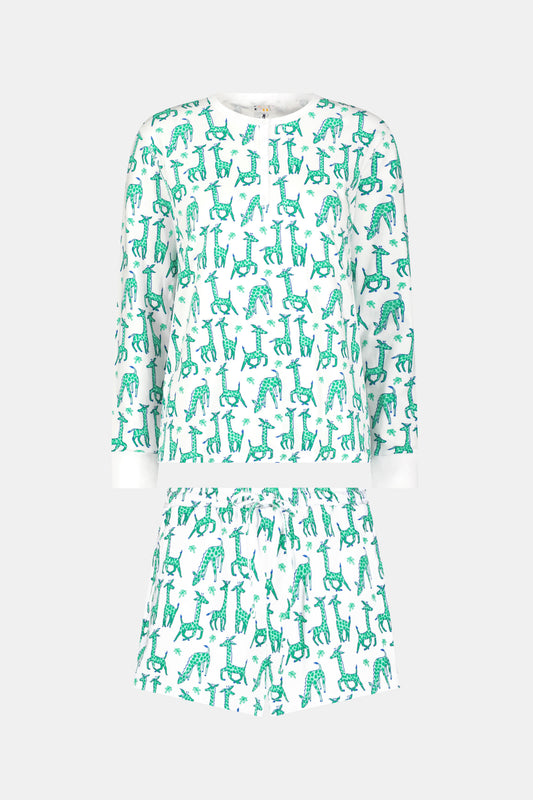 The Gigi Giraffe Hunter Pajamas by Roller Rabbit is a women’s Pima Cotton set with a white base and green-blue giraffe print, featuring a long sleeve top and elastic-waist shorts, shown on a plain light gray background.