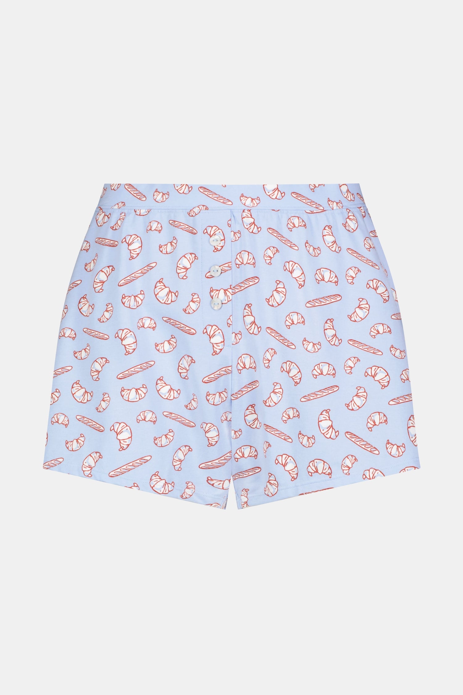 Wearing Roller Rabbit’s Breakfast In Bread Sullivan Shortie pajamas, a person stands against a white background.