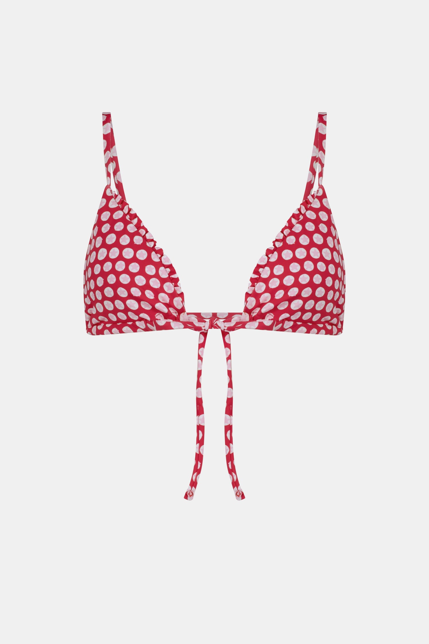 A woman wears the Roller Rabbit Starry Dot Isa Bikini Top, a red triangle bikini with white polka dots and a front tie, shown from shoulders to waist against a plain background.