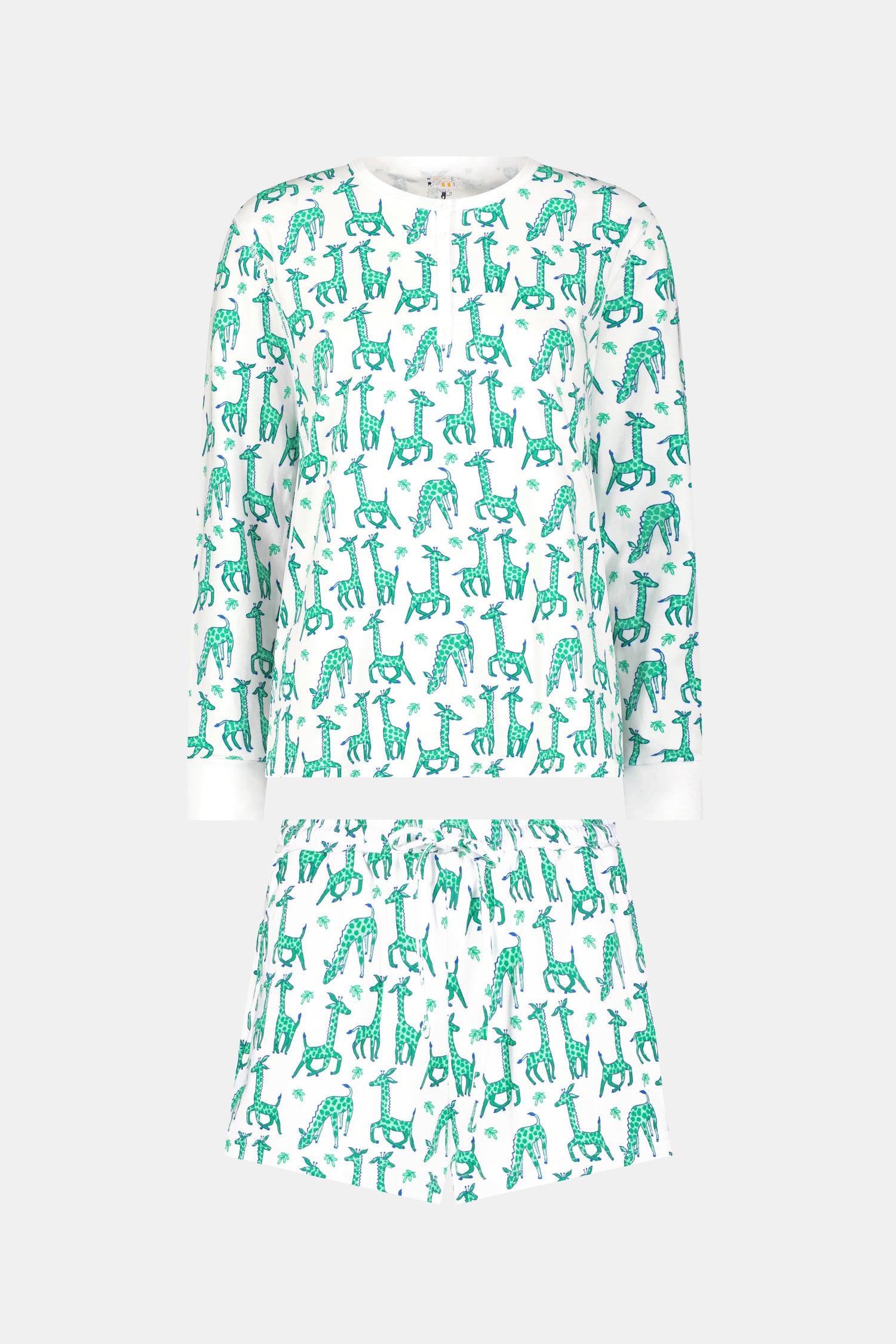 The Gigi Giraffe Hunter Pajamas by Roller Rabbit is a women’s Pima Cotton set with a white base and green-blue giraffe print, featuring a long sleeve top and elastic-waist shorts, shown on a plain light gray background.