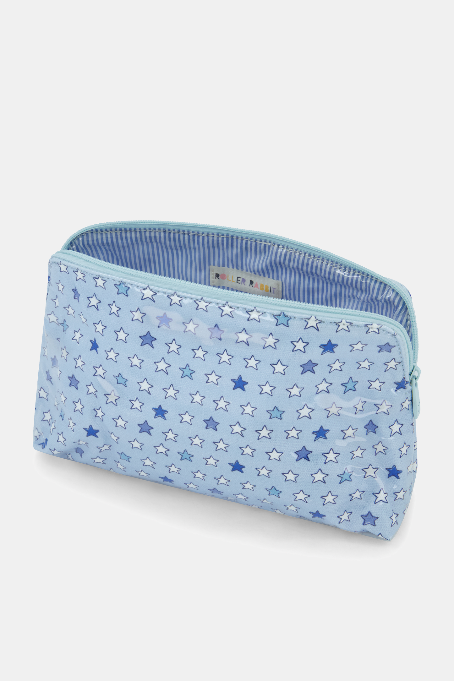 The Pop Stars Makeup Bag is a light blue zippered pouch made from water-resistant cotton canvas with a pattern of dark and light blue stars. When open, it reveals a charming blue and white striped lining inside.