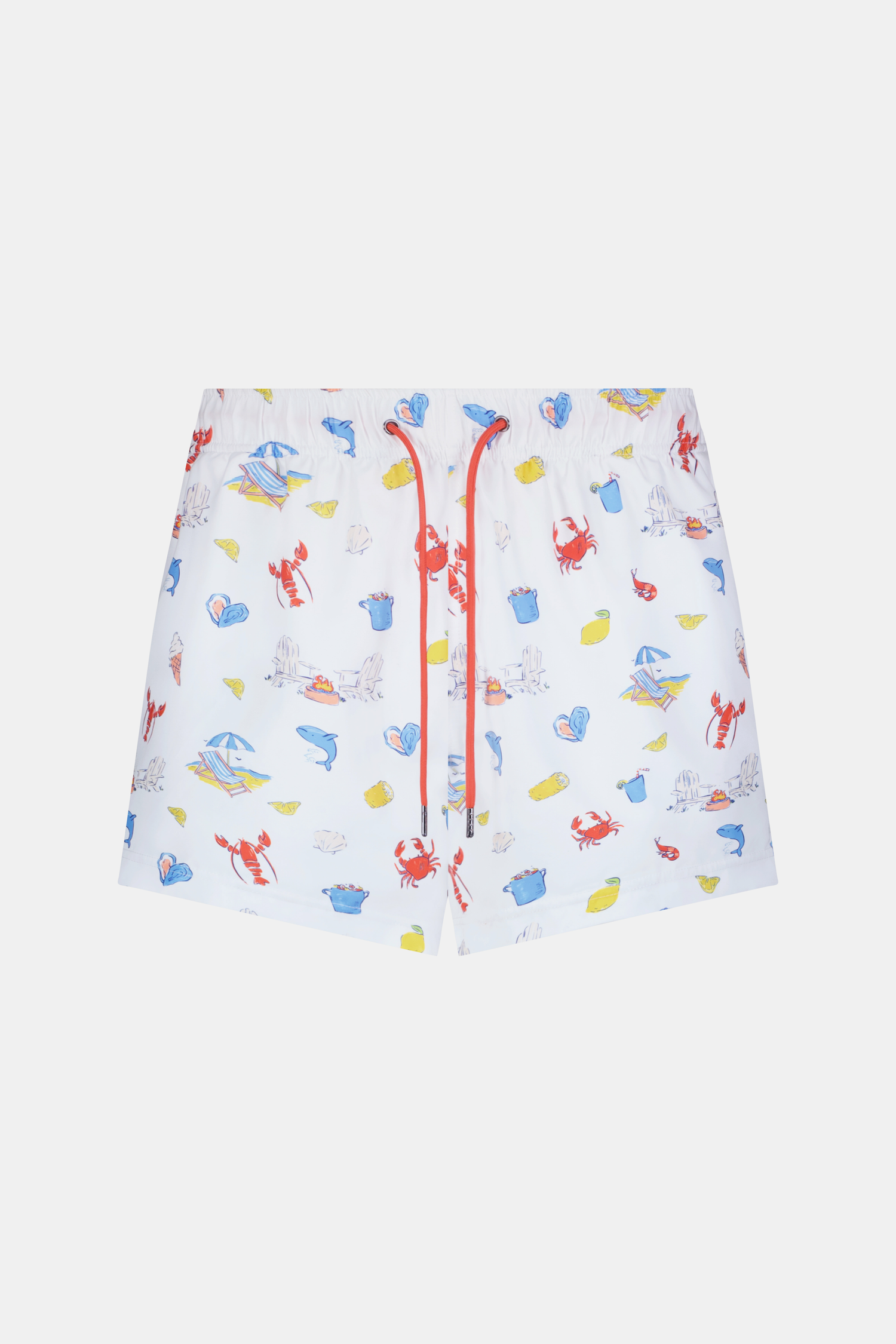 A person stands barefoot, one hand in a pocket, wearing a white T-shirt and Roller Rabbit Men's Catch of the Day Swim Trunk with colorful beach-themed prints, an elastic waistband, and a classic fit.