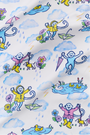 The April Showers Polo Pajamas by Roller Rabbit is a short-sleeved, button-up Pima cotton set with matching shorts, featuring a colorful aquatic animal print in blue, yellow, and purple on white.