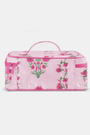 The Roller Rabbit Lily Stripe Carry All Case is a rectangular pink cotton canvas travel case with a top handle, zip closure, and pink and green floral patterns on a plain white background.