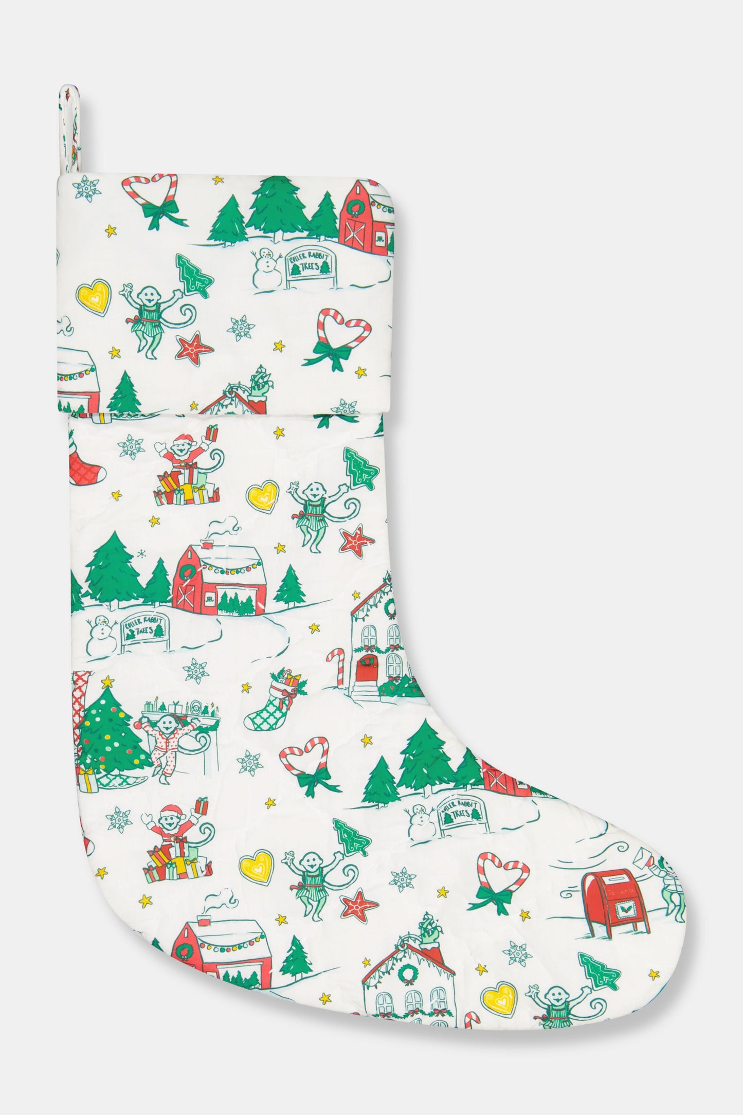 The Roller Rabbit Snow Village Quilted Stocking is a white 100 cotton Christmas stocking featuring festive prints like elves, candy canes, stars, snowmen, gifts, gingerbread house, Christmas trees—perfect for your holiday decor collection.