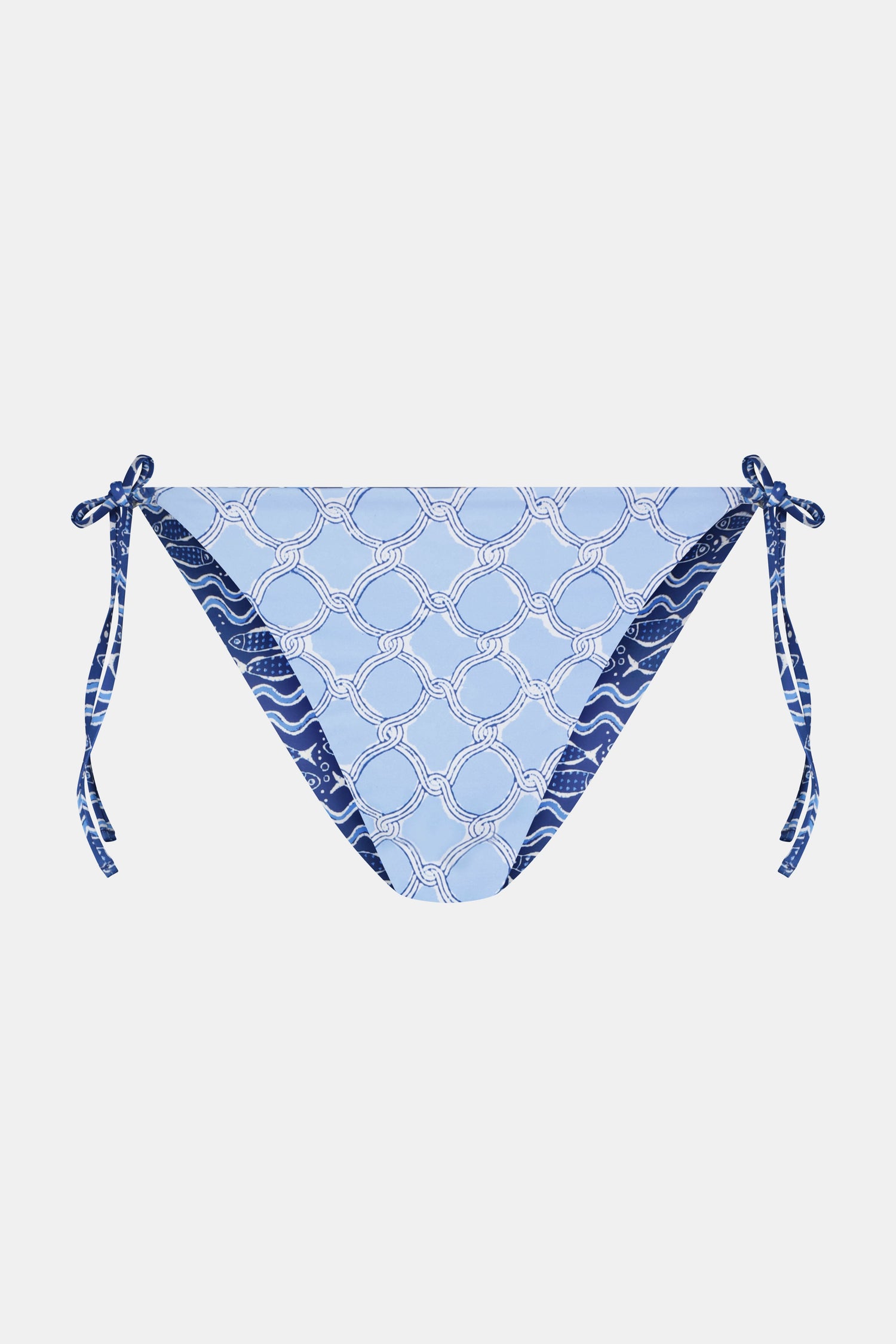 A person wears the Roller Rabbit Fish Stripe/Ruban Serena Bikini Bottom in blue with side ties, shown from torso to upper thighs against a plain white background. This bikini bottom offers UPF 50+ sun protection.