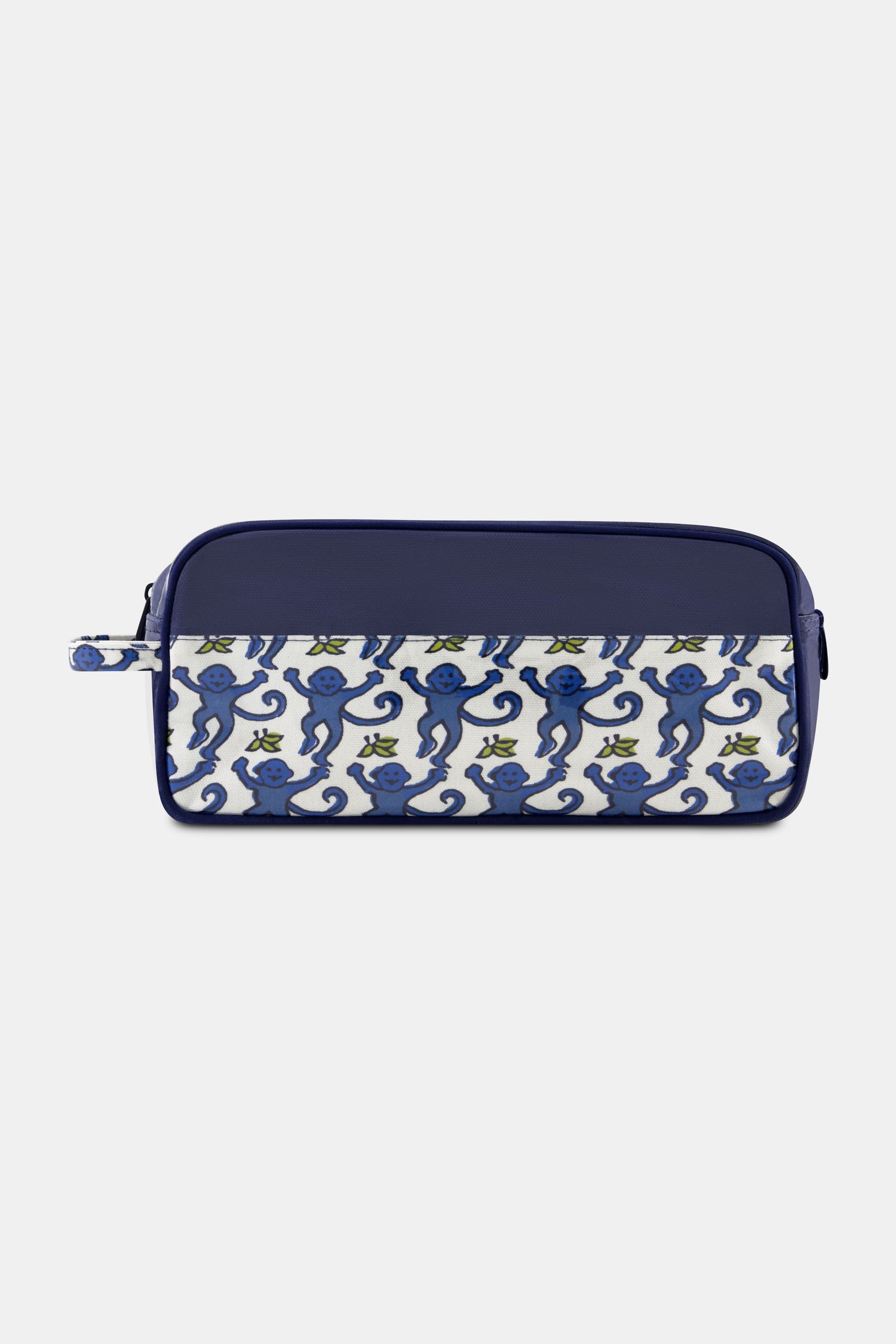 The Roller Rabbit Mens Monkey Dopp Kit is a rectangular blue toiletry bag with playful blue monkeys on a white front pocket, water-resistant material, zipper closure, and a side handle for easy carrying.