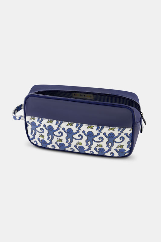 The Roller Rabbit Mens Monkey Dopp Kit is a rectangular blue toiletry bag with playful blue monkeys on a white front pocket, water-resistant material, zipper closure, and a side handle for easy carrying.